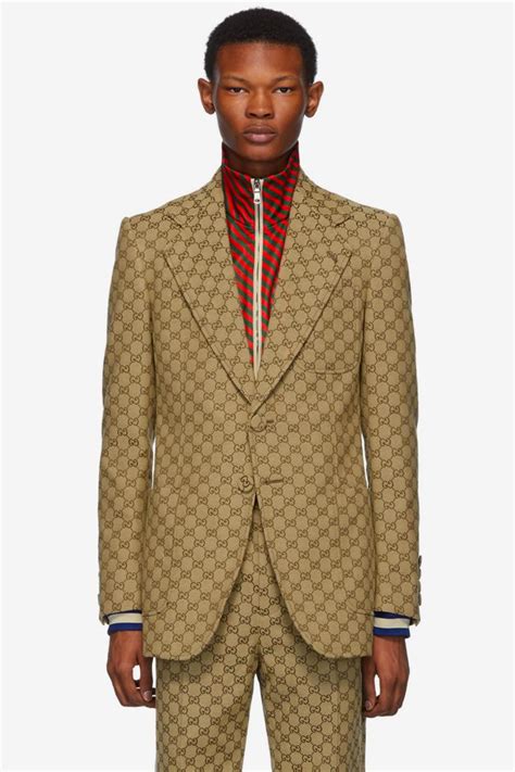 men gucci suit meaning|gucci warm up suits men.